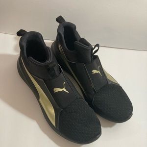 Puma women sneakers sz 8 black and gold
